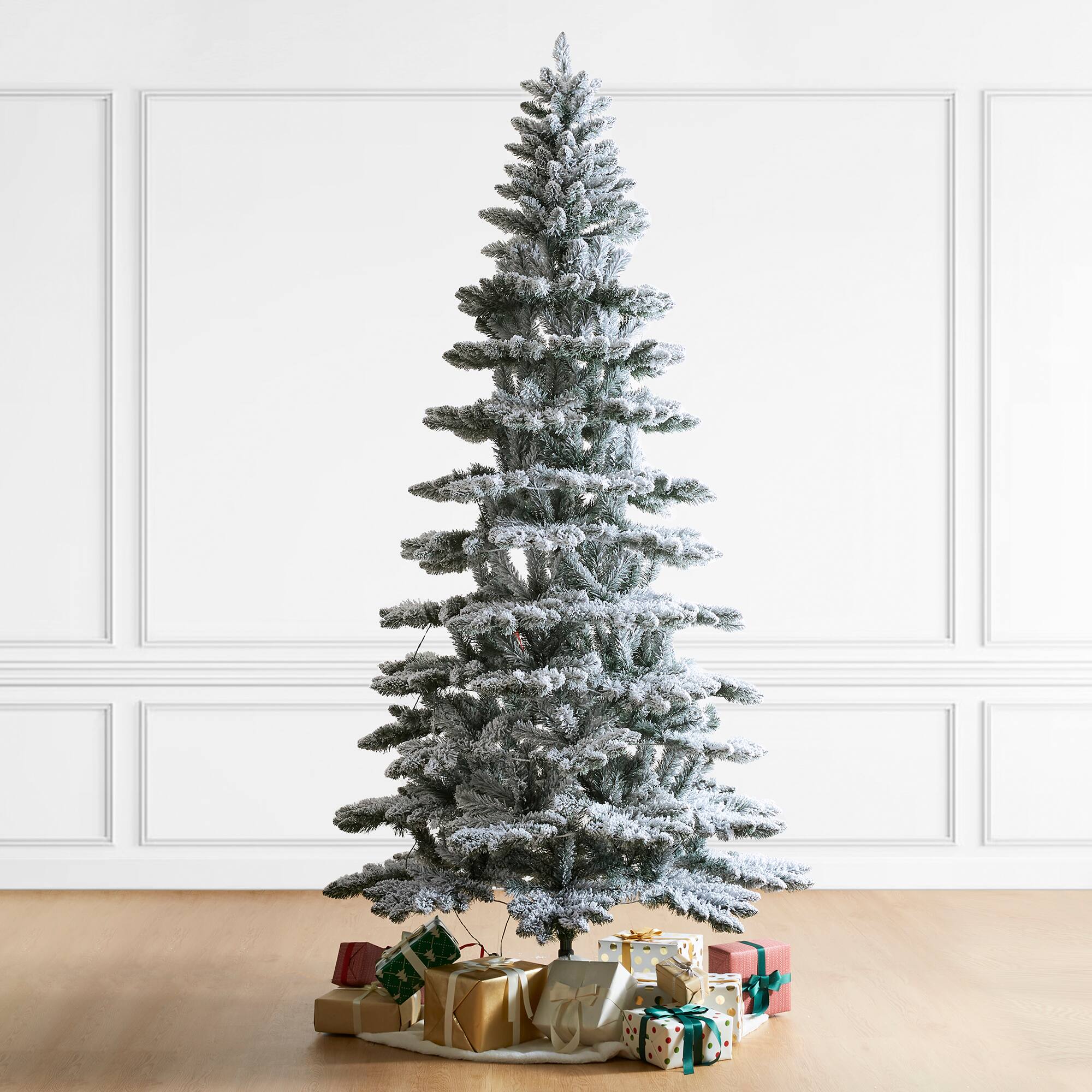 9ft. Pre-Lit Flocked Slim Spruce Artificial Christmas Tree, Warm White LED Lights